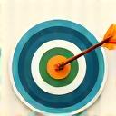 Stylized icon of a target with an arrow hitting the bullseye, representing personal goal setting.