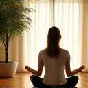 A person meditating calmly in a sunlit room, surrounded by aromatherapy diffusers and soothing elements.